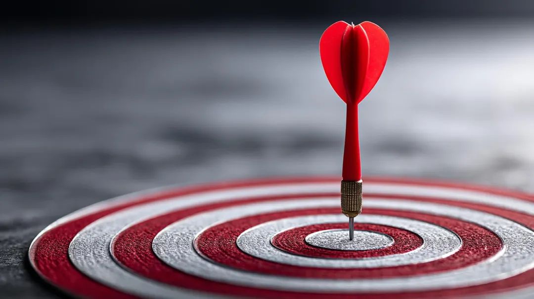 vecteezy_a-red-dart-is-perfectly-placed-at-the-center-of-a-bullseye_63113936.jpg